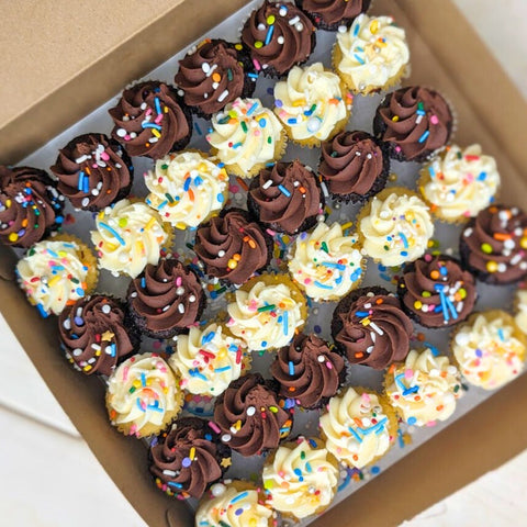 Assortment of 36 mini cupcakes in pastel colors